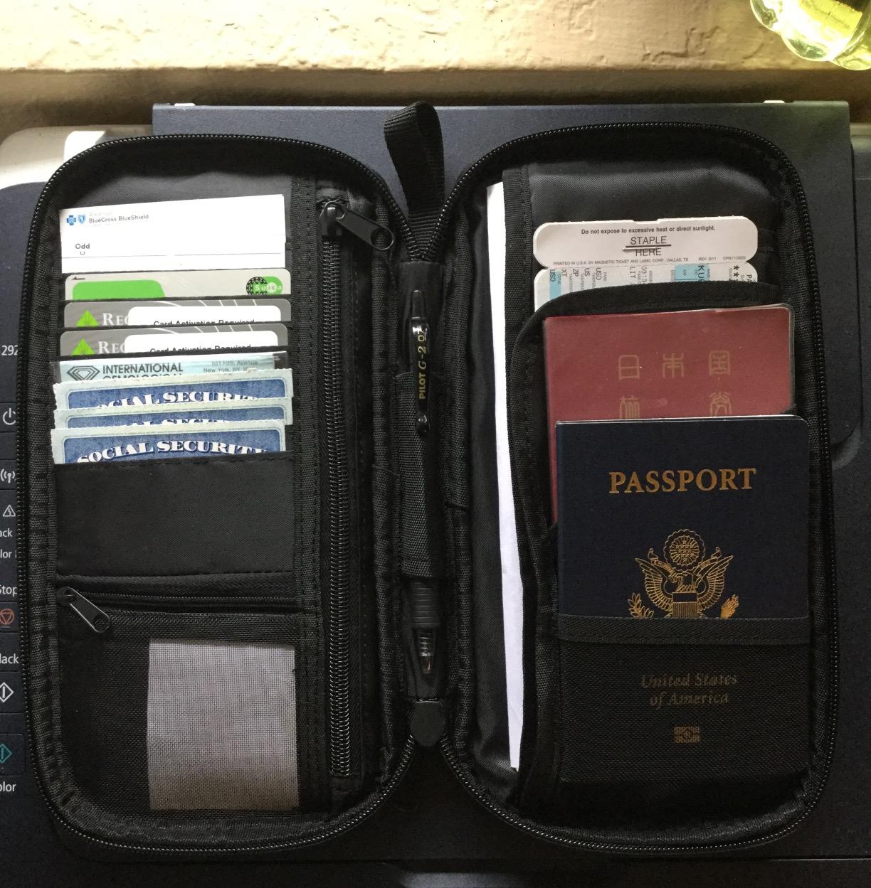 Amazon Basics RFID-blocking Passport Wallet, Passport Holder for Travel, Polyester/Nylon Material with Durable Zipper Closure, Zippered Pockets, Slots for Cards, 10