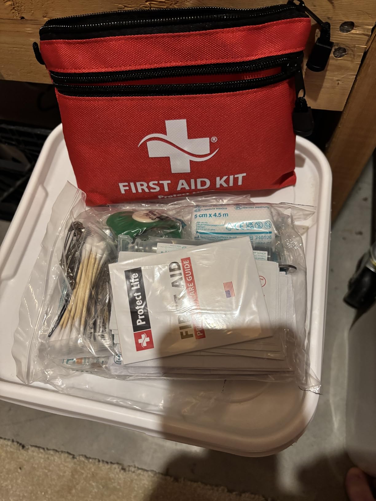 Protect Life Travel First Aid Kit for Car - Small Mini Emergency Kit, 100 Piece Waterproof First Aid Kit for Home, Camping, Boat & Hiking - Includes Emergency Blanket & First Aid Guide customer photo 1