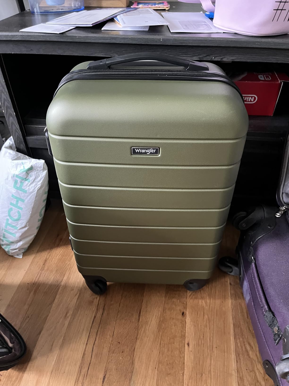 Wrangler Smart Spinner Hardside Luggage, 22-Inch Carry-On, Black customer photo 2