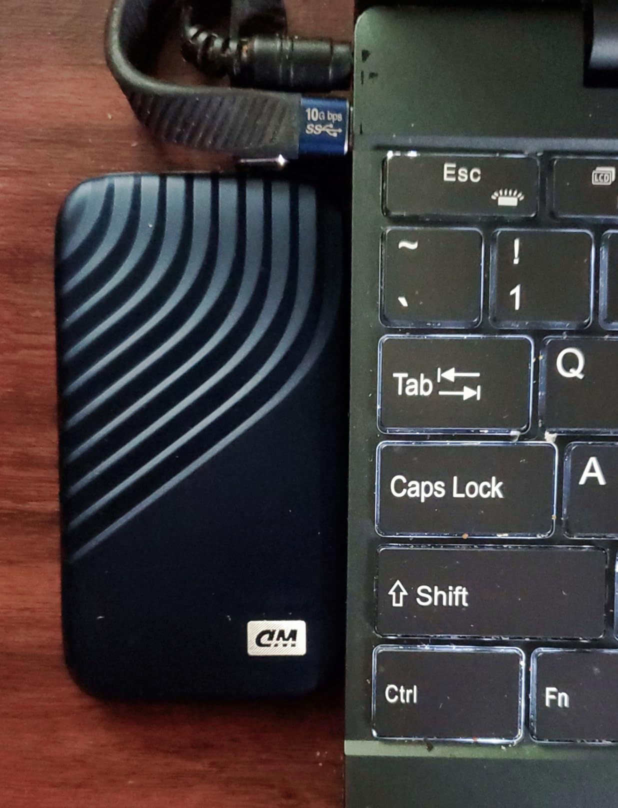 Western Digital 1TB My Passport SSD Portable External Solid State Drive, Gray, Sturdy and Blazing Fast, Password Protection with Hardware Encryption - WDBAGF0010BGY-WESN customer photo 1