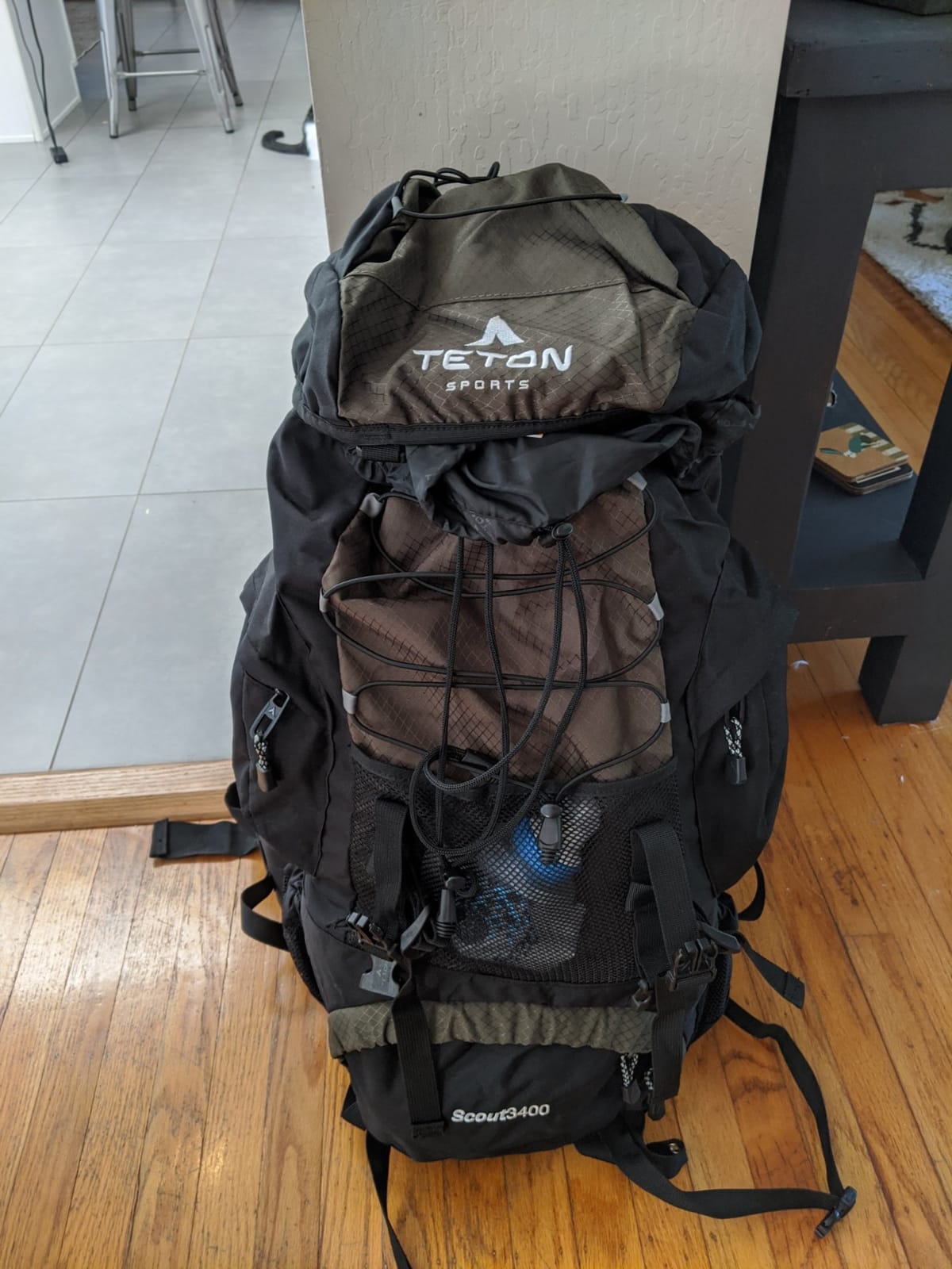 Teton 55L Scout Internal Frame Backpack for Hiking, Camping, Backpacking, Travel, Rain Cover Included, Olive customer photo 1