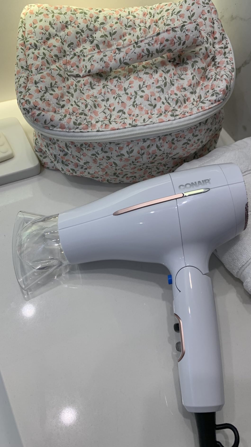 Conair Worldwide Folding Handle Hair Dryer with Concentrator & Diffuser, 1875W Travel Blow Dryer with Smart Voltage Technology, Ionic Conditioning Fights Frizz, 3 Heat & 2 Speed Settings, Purple customer photo 1